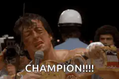 Sylvester Stallone as Rocky Balboa shouting Champion