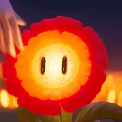Hand touching glowing flower