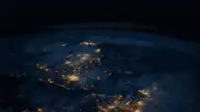 Earth rotating at night from space