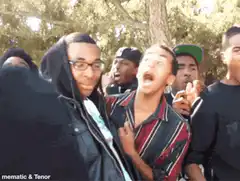 Group of men reacting with shock and excitement