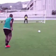 Soccer player scores a goal