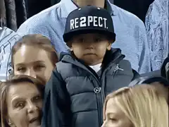 Kid takes off respect hat