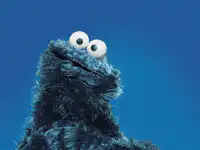 Cookie Monster eats a cookie
