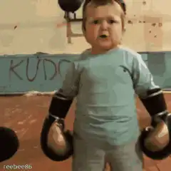 Toddler in boxing gloves