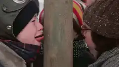 Boy's tongue stuck to pole