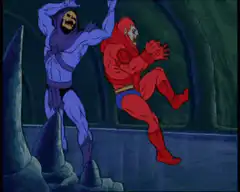 Skeletor punches He-Man