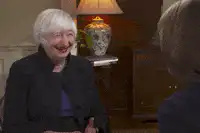 Janet Yellen laughing then saying well