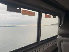 View from a train window over water