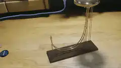 Kinetic sculpture with rolling ball