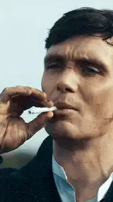Thomas Shelby smoking a cigarette