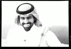 Dubai man blowing kisses with blue hearts