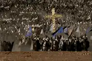 Knights charging with a large cross