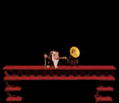 Old man with cane and gramophone on red platform