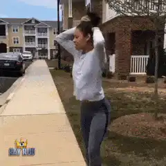 Woman throws pokeball at Mewtwo