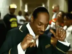 Snoop Dogg dancing in a suit