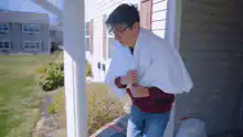 Man falls over after pointing at grass