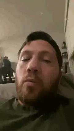 man looking up with eyes rolling