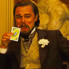 Leonardo DiCaprio holding an Uno reverse card