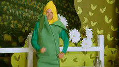 Man in corn costume dancing