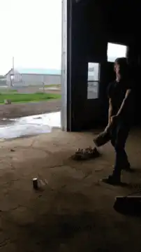man hits can with sledgehammer
