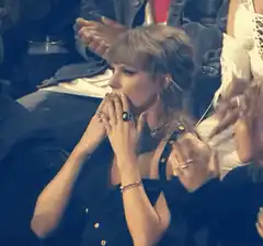 Taylor Swift clapping and pointing