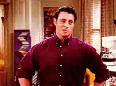 Joey Tribbiani smug smile and crosses arms