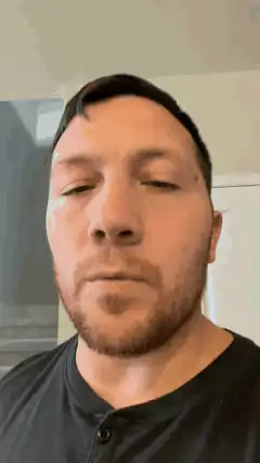 Man blinking with digital glitch effect