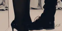 High heel steps on boot