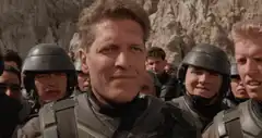 Paul Blart salutes with soldiers