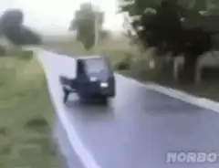 Blue truck driving on a road