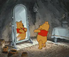 Winnie the Pooh admiring himself in the mirror