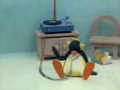 Pingu listening to music on headphones