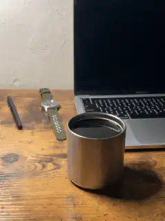 steam rising from coffee cup