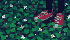 Red sneakers in clover