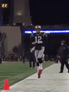 Tom Brady celebrating on the sideline