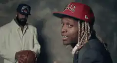 21 Savage salutes with Bulls hat