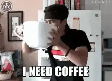 Man drinking from giant coffee mug