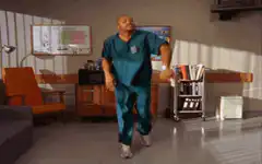 Derek Shepherd dancing in scrubs
