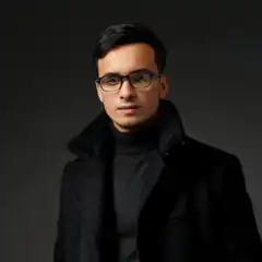 Man in black coat and glasses