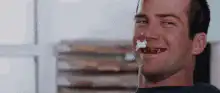 Man with marshmallow on nose
