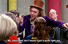 Willy Wonka correcting a boy