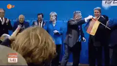 Angela Merkel receives German flag