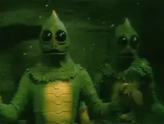 Two green aliens with big eyes