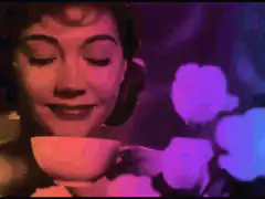 Woman smelling tea with color shifting