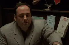 Tony Soprano puts money in his pocket