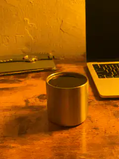 metal cup on desk