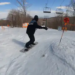 Snowboarder does a backflip