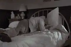 Man wakes up in bed