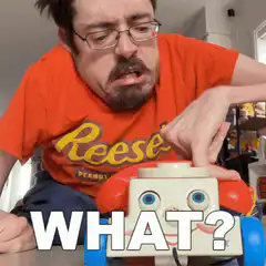 Man reacts with shock to toy phone