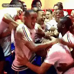 Real Madrid players celebrating in locker room